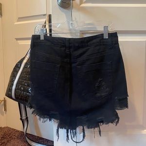 BLACK RIPPED MINI DENIM SKIRT